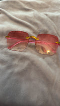 Pink Sunglasses with Gold-Tone Frames and Pink Lenses for Stylish Look